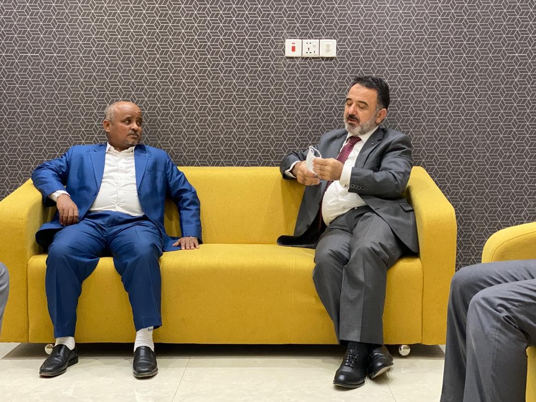 A business handshake between partners.